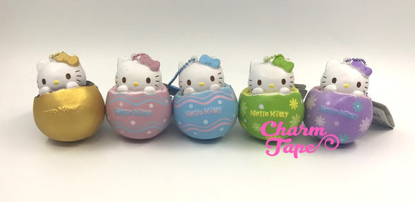 Hello Kitty Chocolate Egg Squishy cellphone charm by Sanrio - Gold