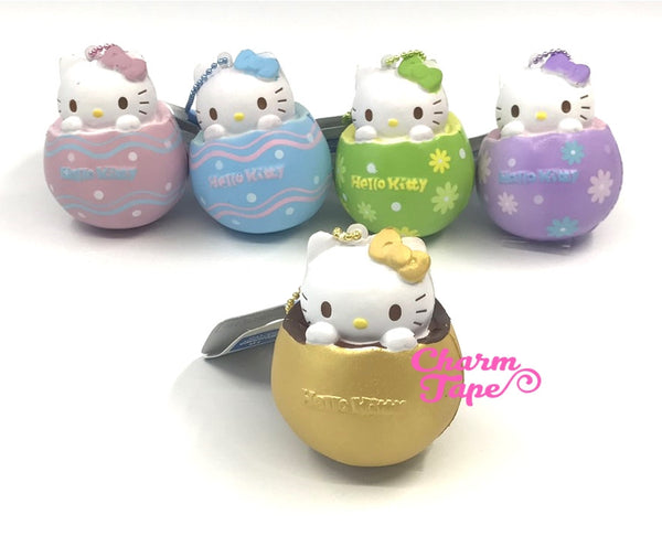 Hello Kitty Chocolate Egg Squishy cellphone charm by Sanrio - Gold